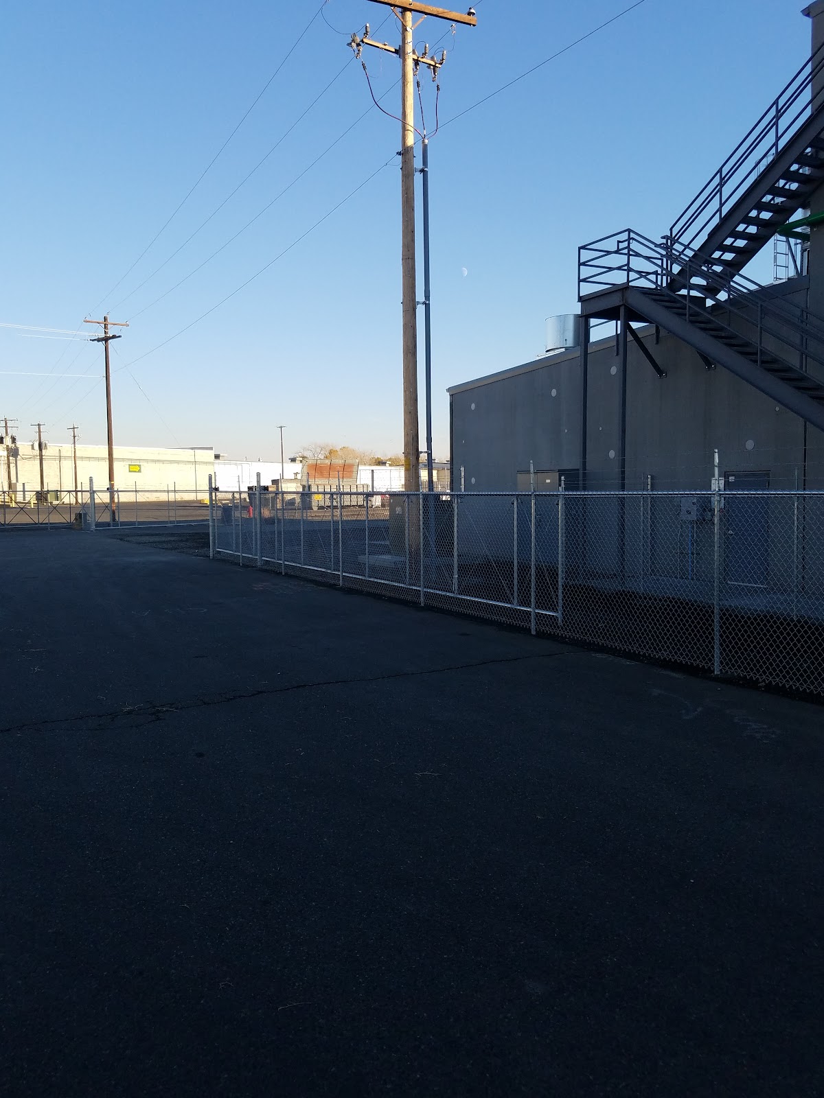Chain link perimeter fence securing a commercial site in Yakima